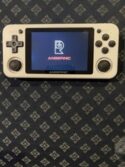 Anbernic RG 351P hand held retro gaming console in white 2300 Games Built In