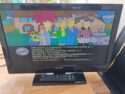 Sharp 24-inch LCD Colour TV with Built-In DVD Player, with Control & Stand